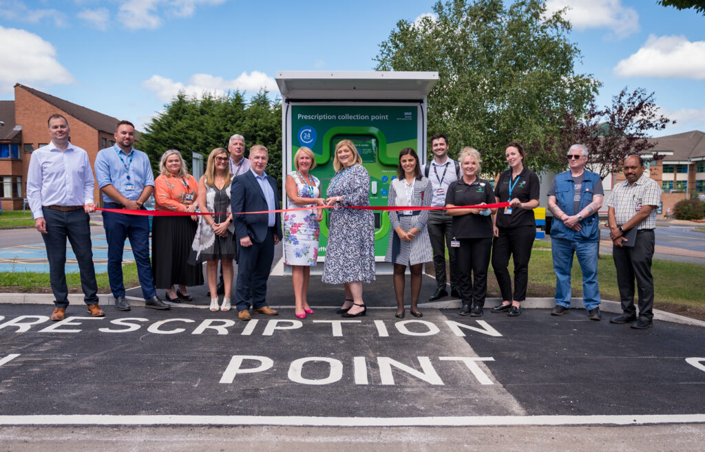 Ribbon cut by staff at launch of prescription unit