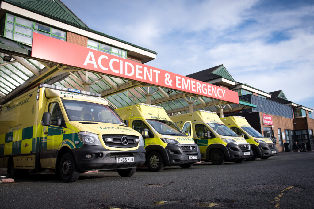 Services under immense pressure as shown by the exterior of Royal Bolton Hospital's emergency department with a full ambulance bay of four ambulances