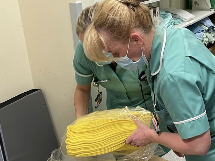 Yellow socks and blankets rolled out for patients at risk of falling