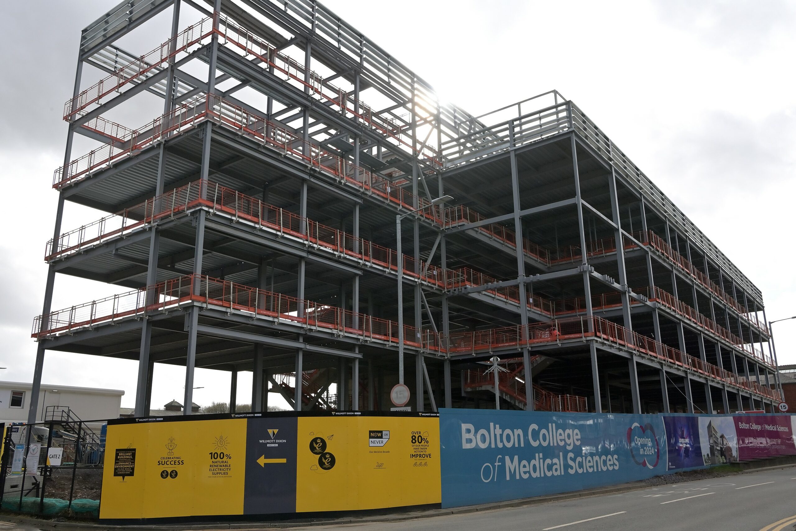 Steelwork of Bolton College Medical Sciences on an overcast day