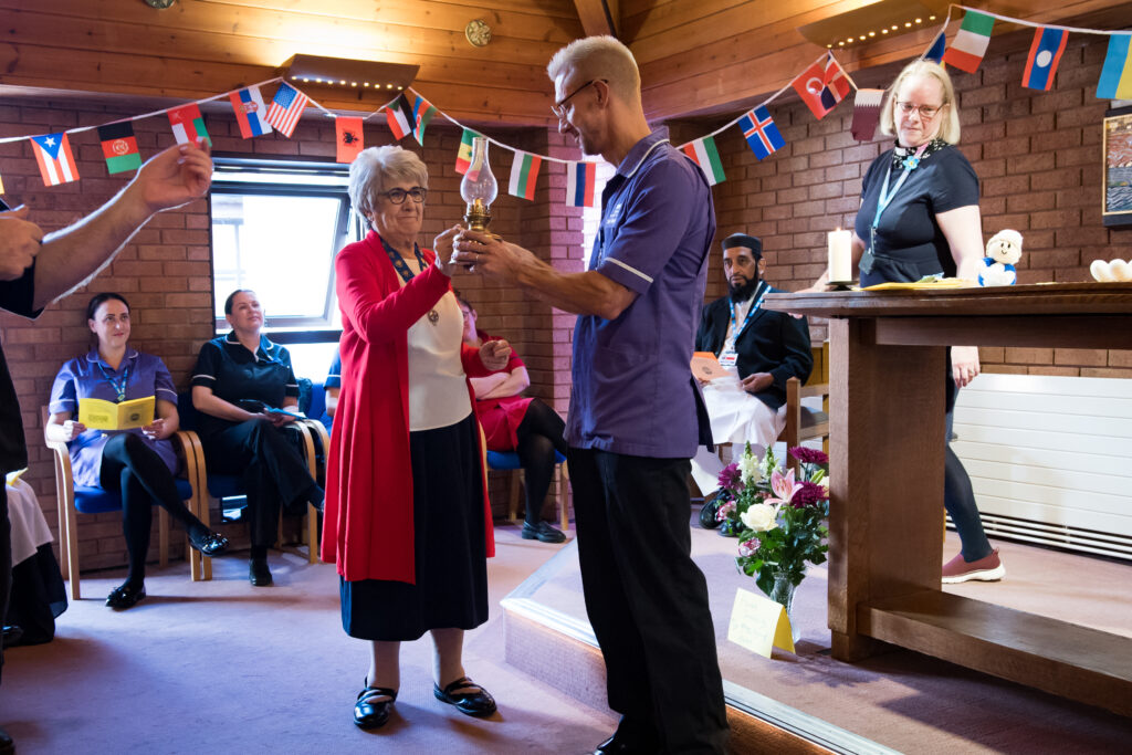 Two people in a chapel on International Nurses Day