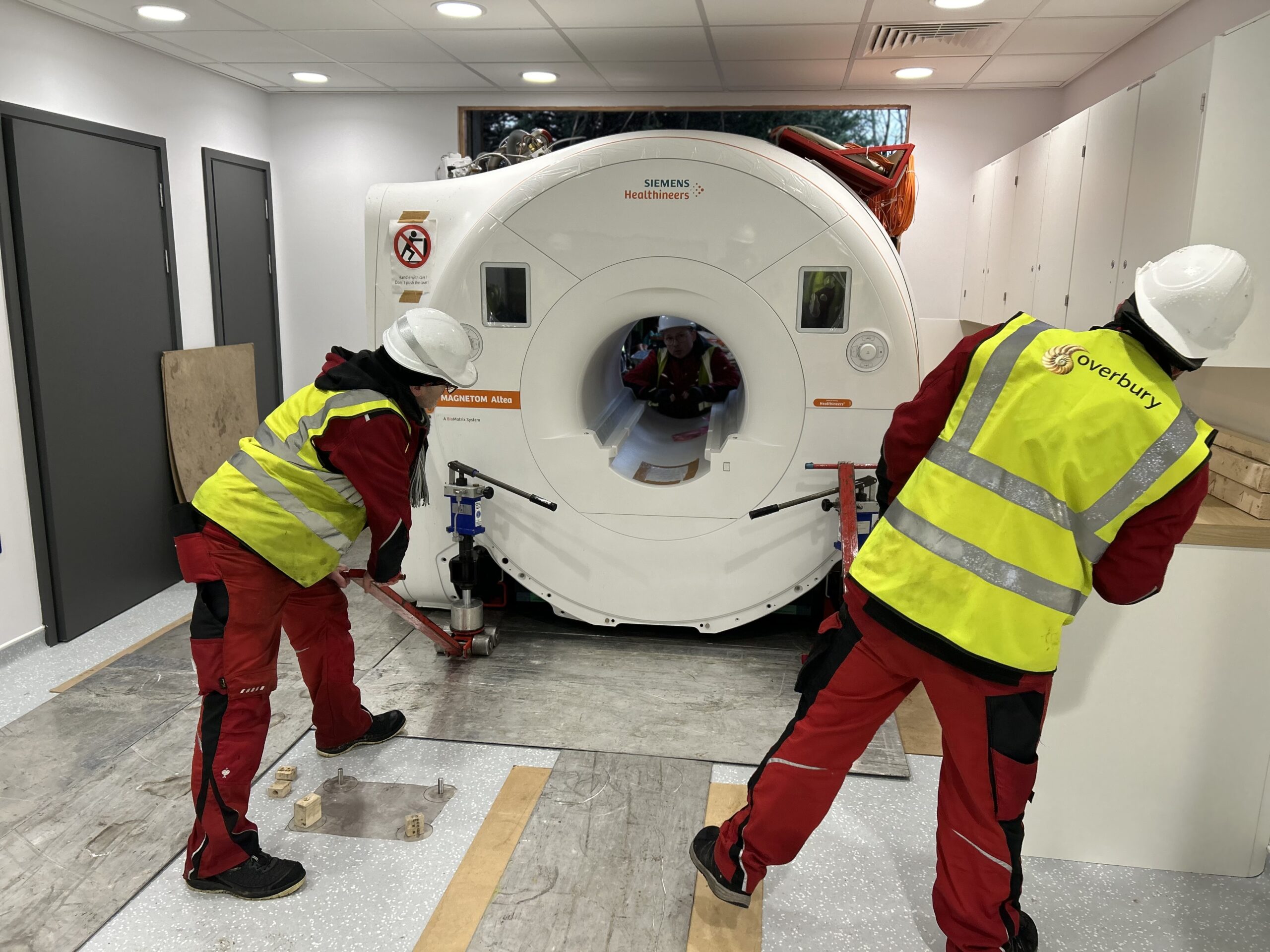 MRI scanner being put into place