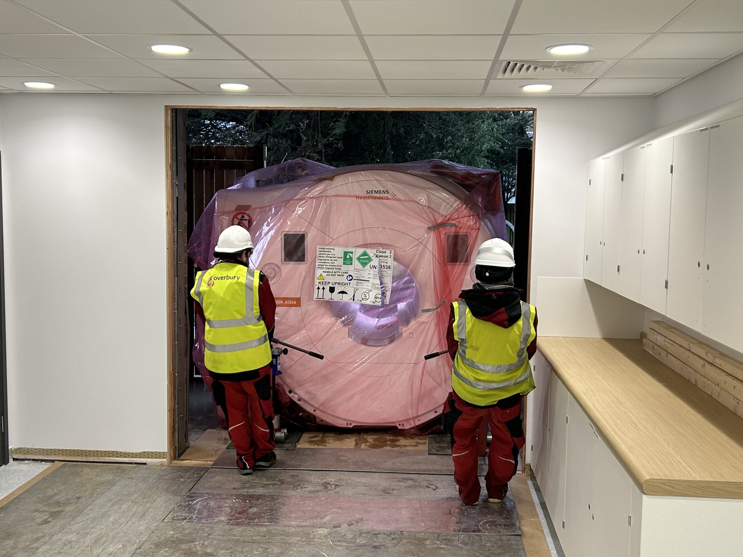 MRI scanner being carefully moved into CDC