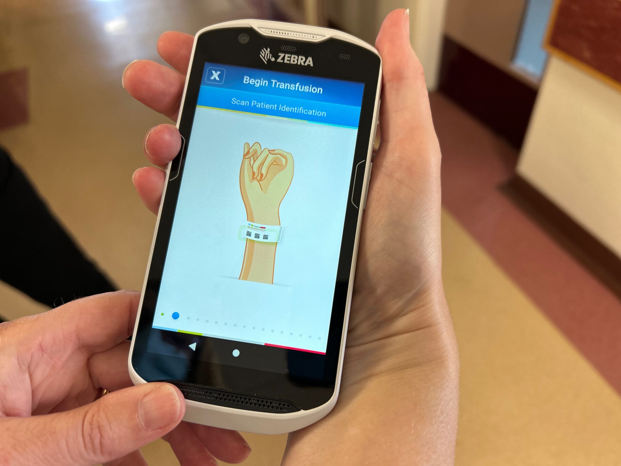 New technology that supports with blood transfusions. Screen shows instruction for scanning patient ID