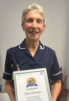 Jean Cummings with 60 year certificate