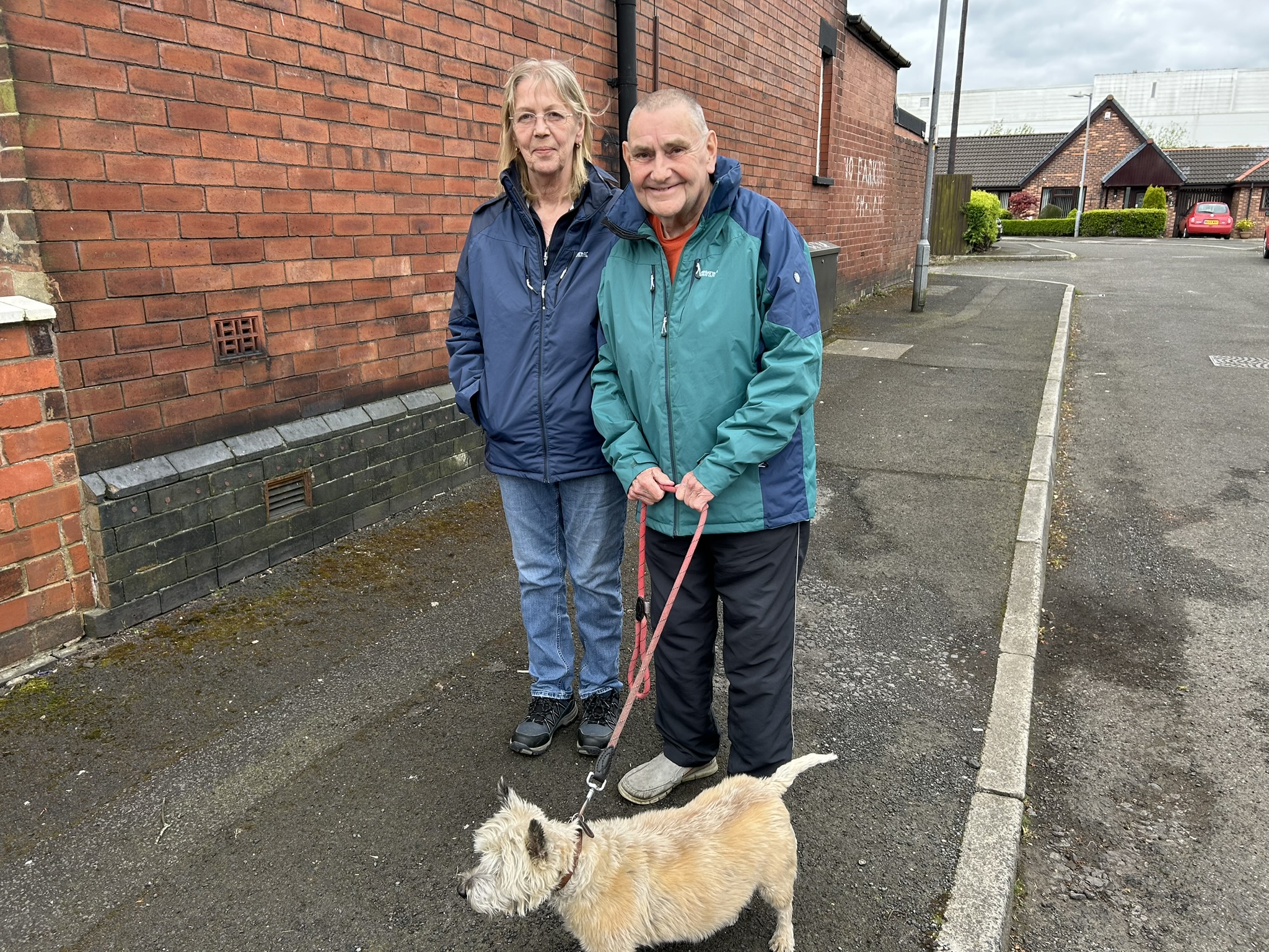 Graham with his wife, Julie, and dog, Joxie