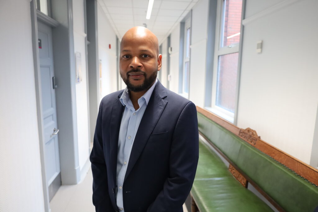 Tiri Mutambasere in Trust HQ corridor