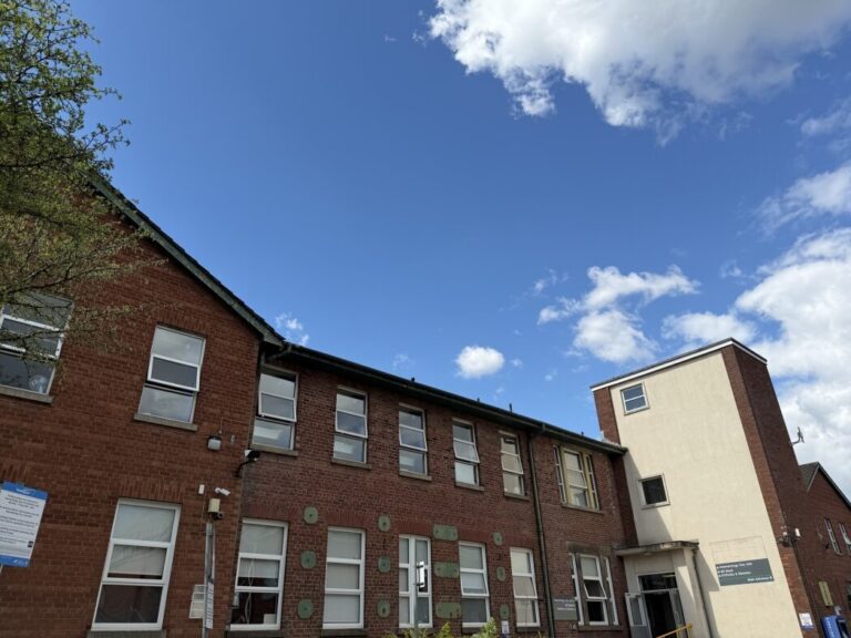 Exterior of N Block with blue sunny skies