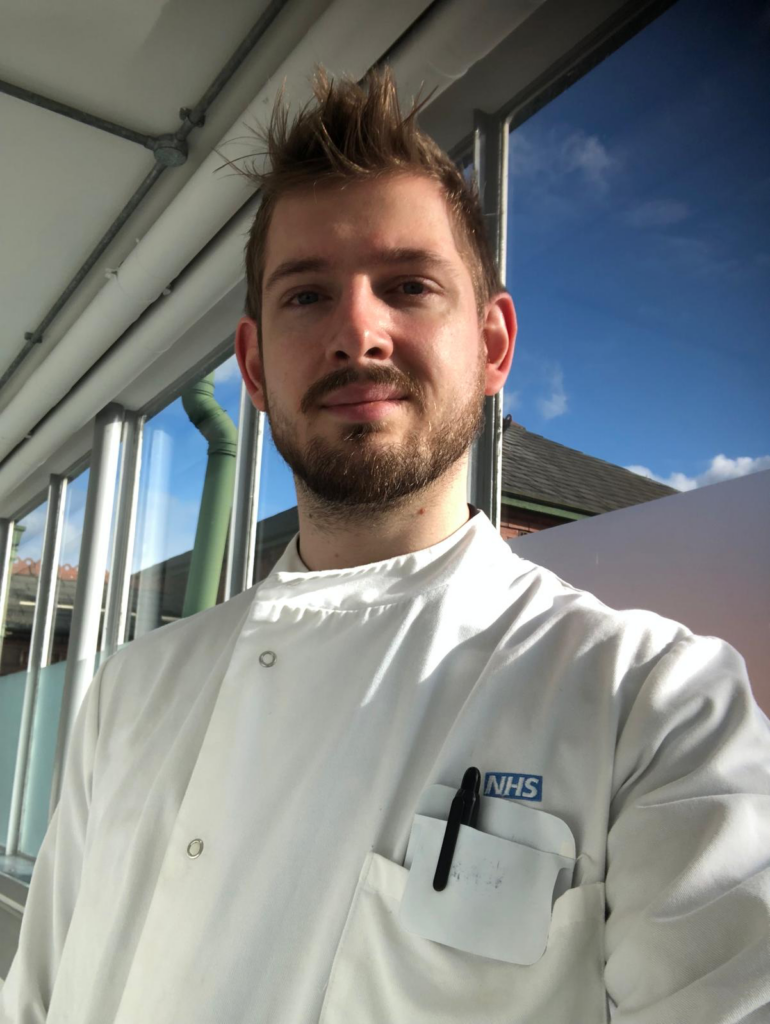 Lorenz Becker selfie in lab coat