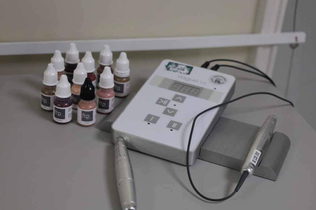 Nipple tattoo kit and ink bottles