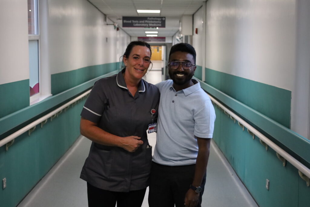 Joice Joy has a photo with a colleague from B2 ward
