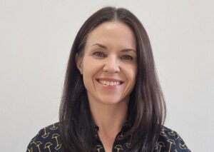 Joanne Downs smiles in portrait photo for new CFO appointment