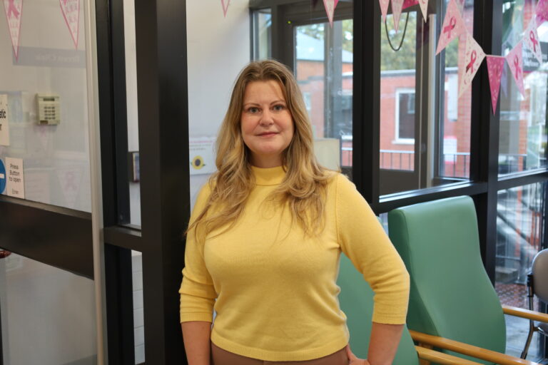 Sarah Hickman has a photo taken in Bolton's Sunflower Suite