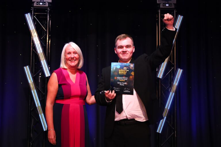 James Tootill poses for a picture with his FABB Award